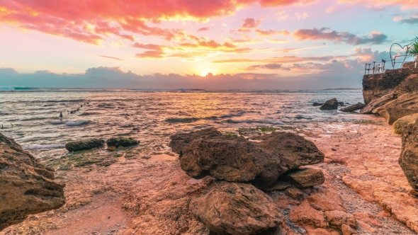 Sunset on the Stony Beach of the Island Nusa Ceningan, Indonesia