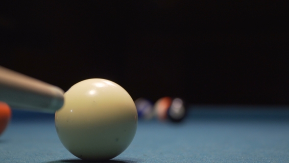 American Pool, Young Man Is Aiming To Hit the Ball in the Pocket