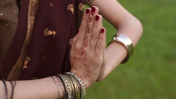 of Hands of an Indian Girl with Mehendi