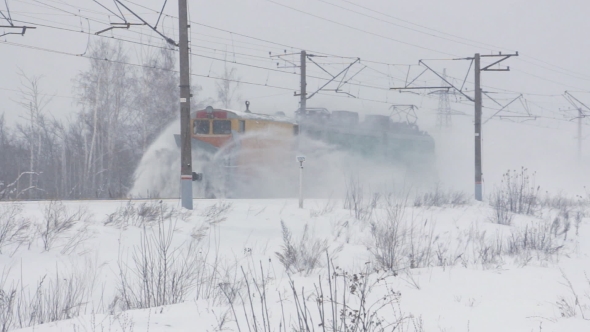 Train Snow Blower Cleans a Railway