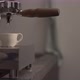 Man Making Espresso with Single Spout Portafilter on Coffee Machine - VideoHive Item for Sale