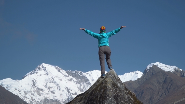 The Girl Climbs To the Top of the Cliff