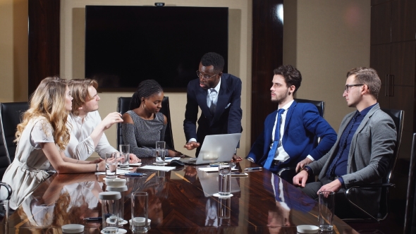 Confident And Attractive Multi-Ethnic Business Team In A Meeting.