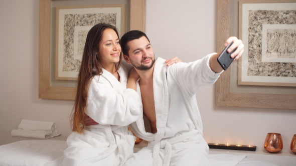 Attractive Young Couple Makes a Selfie in Spa Center.