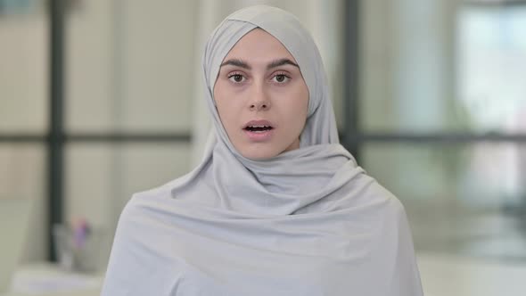 Young Arab Woman Feeling Shocked