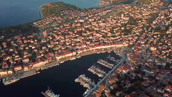 Aerial view of boats anchored at Mali Losinj bay during the sunset, Croatia.