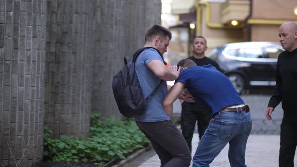 Brave Man Fighting with Muggers on Deserted Lane