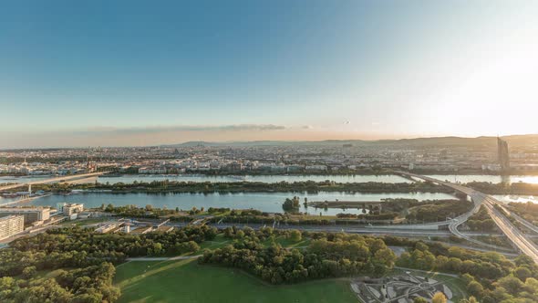 Aerial Panoramic View of Vienna City with Skyscrapers Historic Buildings and a Riverside Promenade