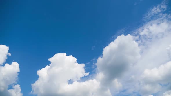 Clouds Move Smoothly in the Blue Sky. Timelapse