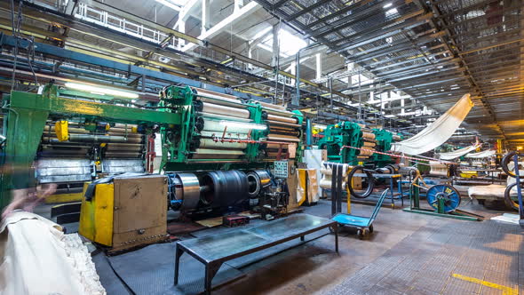 Time Lapse Employee Works with Equipment at Work Shop