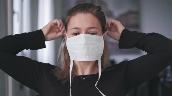 Woman Wearing Surgical Mask for Corona Virus Isolation 