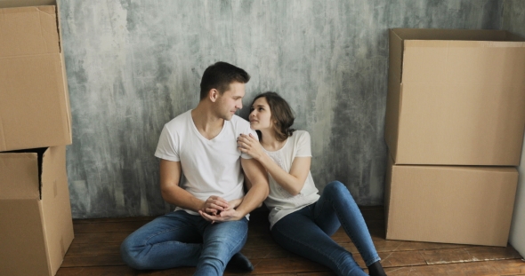 Young Couple Very Happy and Excited About Moving Into New Apartment
