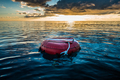 Red buoy for freediving floating in the ocean. - PhotoDune Item for Sale