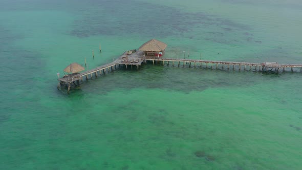 Wooden Beach Bar in Sea and Hut on Pier in Koh Mak Island Trat Thailand