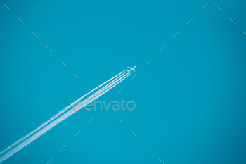 Airplane In The Sky With Plane Trails / Photodune, Misc
