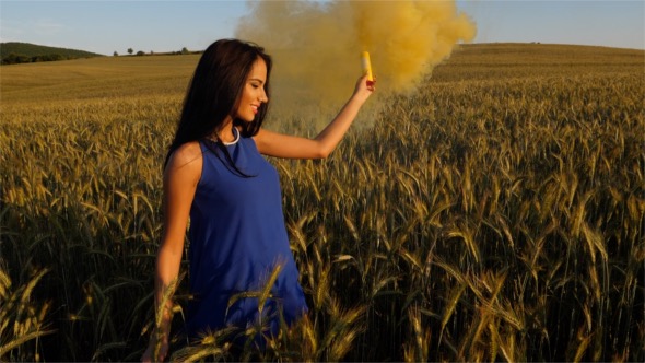 Happy Girl in Wheat Field