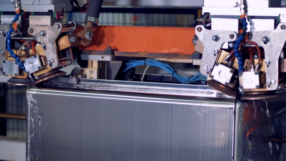 A Robotic Machine Operating with Steel Box.