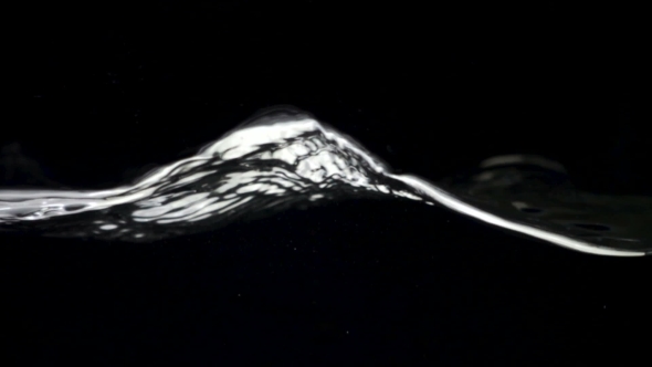 Slo-motion Water Against Black Drop