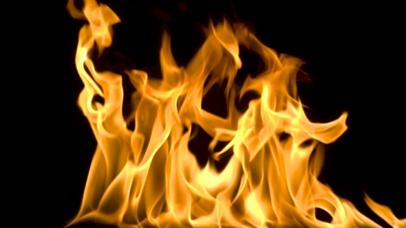 Fire and Flames Burning on a Reflective Glass Surface, in  with a Black Background, with the Flame
