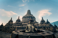 Statue of meditating Buddha. Borobudur temple. Java, Indonesia - PhotoDune Item for Sale