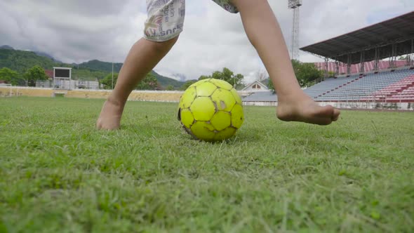 Leg's Boy Running With Soccer Ball