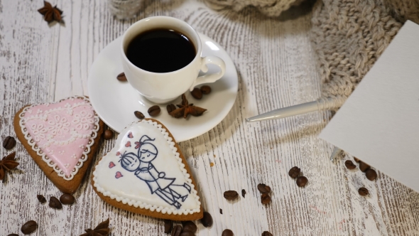 Couple Relations St Valentine Day Concept A Cup of Coffee and Ginger Biscuit with Knitting Needle