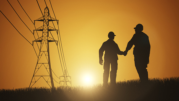 Architect And Construction Worker Shaking Hands Over Sunset Sky alt
