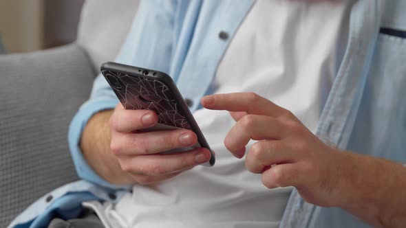 Unrecognizable Male Hands Hold Cell Phone Close Up View