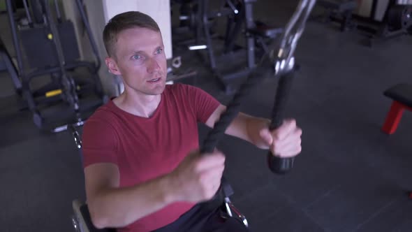 Man Working Out at the Gym