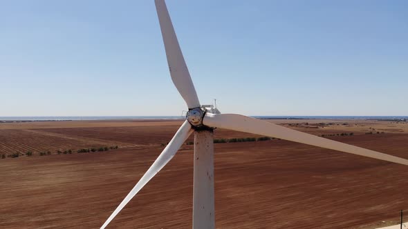 Small Wind Turbines with Blades in the Field Aerial View