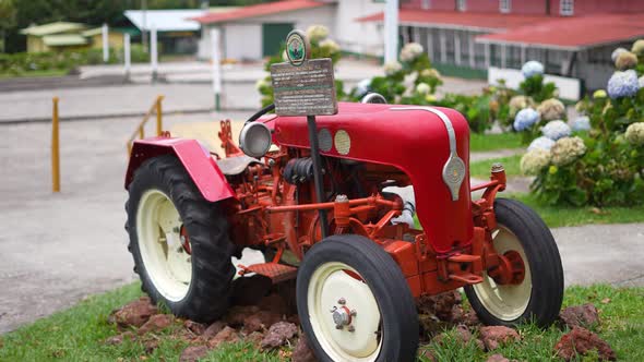 red tractor, antique, tractor for the field, tourism, field, costa rica