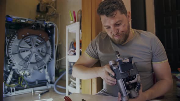 Young Housewife Does Not Know How to Fix His Broken Washing Machine