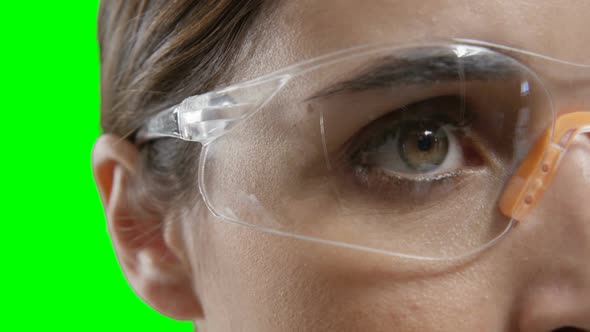 Close-up of woman wearing protective eyewear