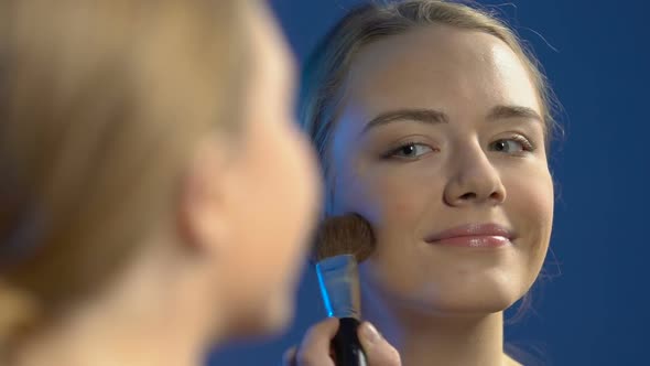 Smiling Girl Applying Evening Make-Up, Sending Air Kiss to Mirror, Vanity