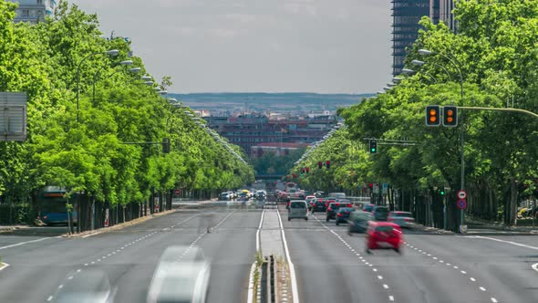 Paseo De La Castellana Street Traffic Timelapse Near Puerta De Europa Towers As Viewed From Plaza De