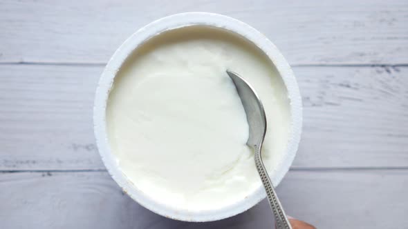 Fresh Yogurt in a Bowl on Table