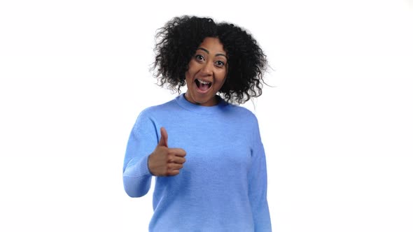 African Woman Showing Thumb Up Sign on White Background