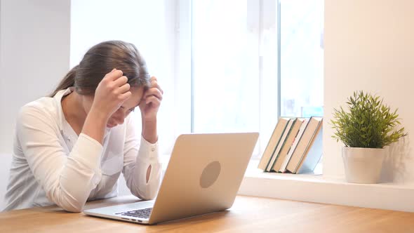 Upset Sad Young Girl at Work