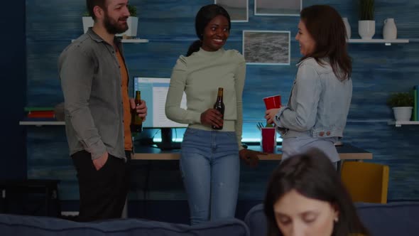 Multiracial Friends Hanging Out Together Socializing While Looking at Funny Video