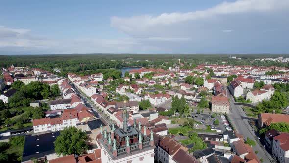 Neustrelitz cityscape. Aerial view of the town square with city church.
