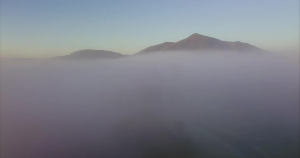 Mountain above fog