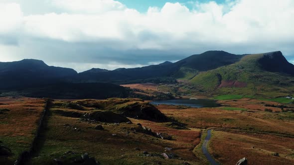 Aerial descent from the view of the lakes to the lower ground. Snowdonia,Wales,UK