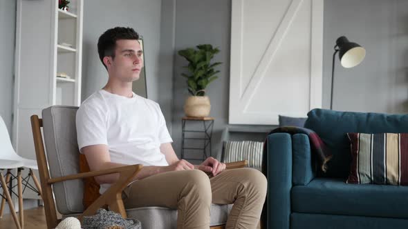 Casual Man Leaving Couch in Room