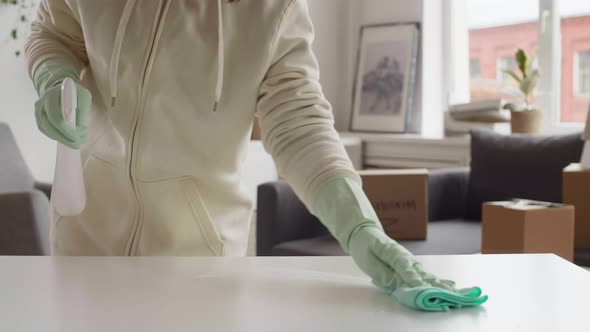 Unrecognizable Person Cleaning Apartment after Moving