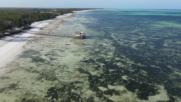 Aerial View of a House on Stilts in the Ocean on the Coast of Zanzibar Tanzania Slow Motion