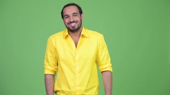 Young Happy Bearded Indian Businessman Smiling