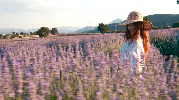 Happy Woman in Lavender Field