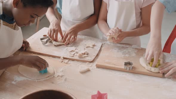 Multiethnic School Children Making Cookies