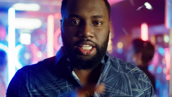 African American Man Having Fun at Party. Active Male Person Dancing in Club