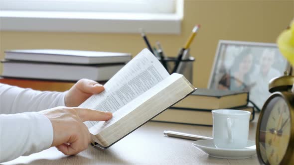 Woman Reading the Bible and Praying alt
